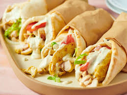 Chicken shawarma wrap with grilled chicken, vegetables, and sauce